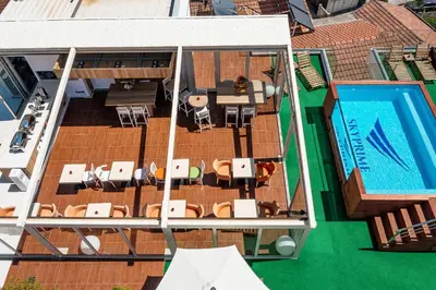 an overhead view of a balcony with a swimming pool at Villa Skyprime in Budva