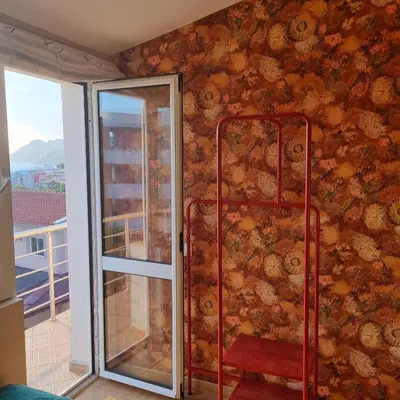 a room with a wall with at Апартаменты Anturage с отдельным входом in Dobra Voda