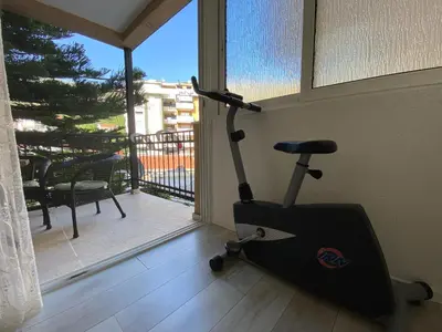 a room with a exercise bike in front of a window at Egon Apartments in Budva