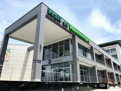 a building with a sign on the front of it at Top-Top in Podgorica