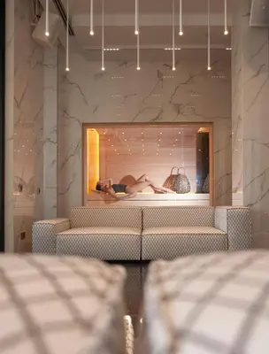 a woman laying on a couch in a store window at Villa Geba Boutique Hotel in Sveti Stefan