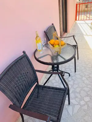 two chairs and a table with a bowl of oranges at Gara 5 in Kotor