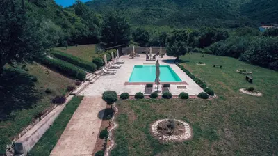 an aerial view of a swimming pool in a garden at MonteBay villa in Budva