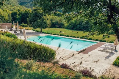 a swimming pool in the middle of a yard at MonteBay villa in Budva