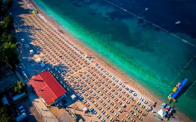 an overhead view of a beach with a group of boats at Meric Duplex Apartment in Budva