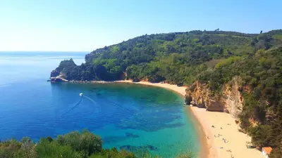 an aerial view of a beach with people on it at Meric Duplex Apartment in Budva
