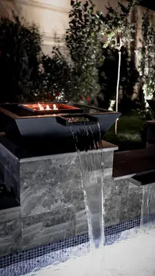 a water fountain in the middle of a yard at Boutique Hotel Momentum by Aycon in Budva