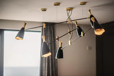 a group of shoes hanging from a ceiling at Dollaku Apartments in Bar