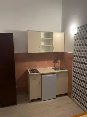 a kitchen with a sink and a counter top at SARA BUDVA in Budva