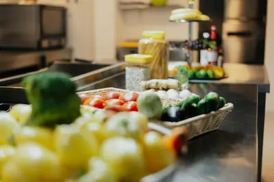 a bunch of vegetables on a counter in a kitchen at AM Palace in Ulcinj