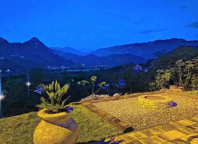 two large vases sitting on top of a hill at Apartments Monte Green in Virpazar