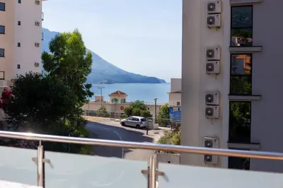 a view of the water from a building at Apartmani Becici in Becici