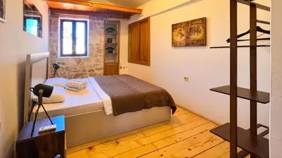 a bedroom with a bed in a room at Old Town Homestel in Kotor