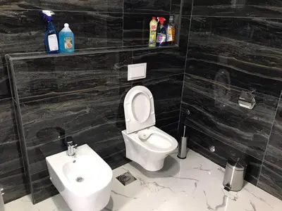 a bathroom with a toilet and a sink at Adriatic Oasis in Bar