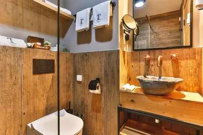 a bathroom with a sink and a toilet at Boutique Hotel Tate By Aycon in Budva