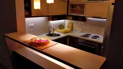 a kitchen with a bowl of fruit on a counter at Apartments Abramovic 2 in Sutomore