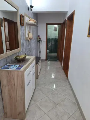 a kitchen with a sink and a counter top at Apartments Klakor PS in Tivat