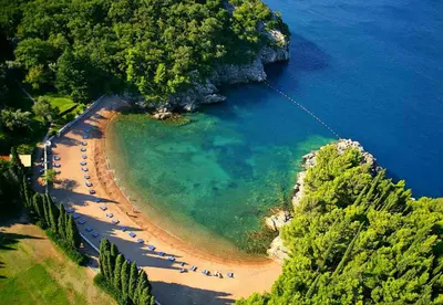 an aerial view of a beach with a group of people at Lux Pržno View Penthouse in Budva