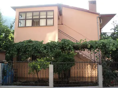 a house with a fence in front of it at Apartment Sali in Kotor