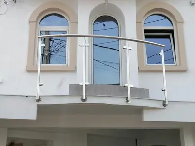 a balcony on a building with two windows at Guest house Nina in Bar