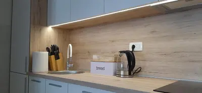 a kitchen with a counter with a sink and a counter top at Lux Apartment PortoVista in Bar