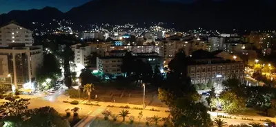 a view of a city at night with lights at Lux Apartment PortoVista in Bar