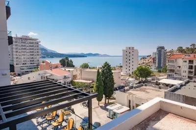 a view of the water from a city at L’odore Del Mare in Sutomore