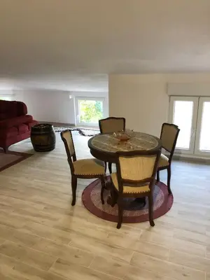 a dining room with a table and chairs at Green Silence - Anja in Danilovgrad