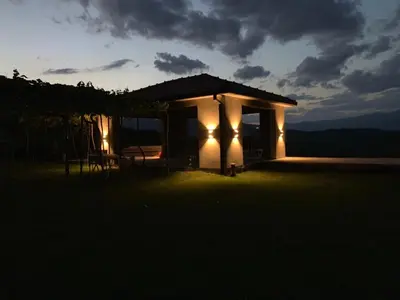 a lit up gazebo with lights on it at night at Green Silence - Anja in Danilovgrad