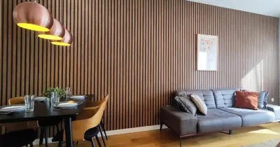 a living room with a couch and a table at Wonderful Apartment near City Mall in Podgorica