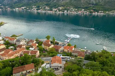 an aerial view of a town on a lake at Java Apartments in Dobrota