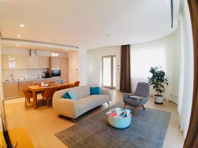 a living room with a couch and a table at Sea View Villas in Duklei in Budva