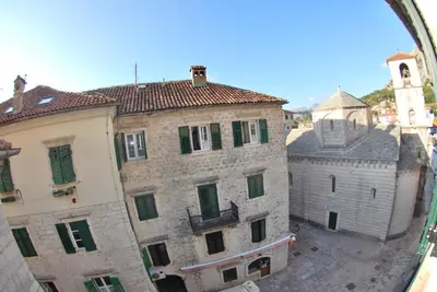 an aerial view of an old building and a church at Apartment Antonia in Kotor