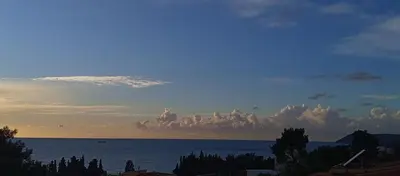 a view of the ocean with clouds in the sky at Joksimović apartmani in Bar, Susanj