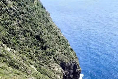 a view of the side of a mountain next to the ocean at Charming Villa with Pool, Sea View in Zagora in Zagora