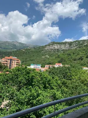 a view of a city with mountains in the background at Guest House Mudresa in Budva