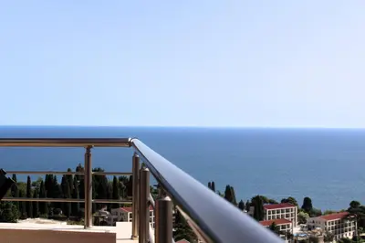 a view of the ocean from a balcony at Apartments Olga in Ulcinj