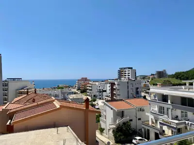 a view of a city with buildings and the ocean at Fimi Apartments in Ulcinj