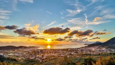 a view of a city with the sunset in the sky at Ranc Mujica in Bar