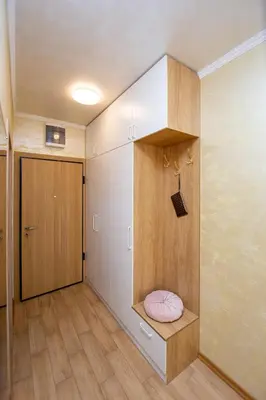 a small room with a shelf and a door at Krizor Apartman Budva in Budva