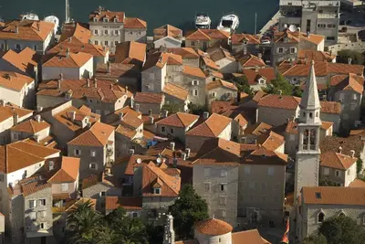 a view of a town with red roofs at Apartments Inspiration in Budva