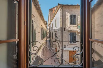 a view of an alley from a window at Sasha di Cattaro - Old Town Lux Apartment in Kotor