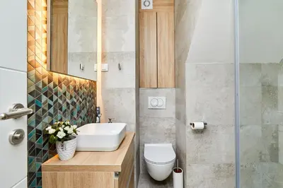 a bathroom with a sink and a toilet at Old Town Casa Dameo Apartments in Kotor