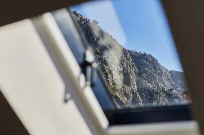 a view of a mountain from a car window at Old Town Casa Dameo Apartments in Kotor