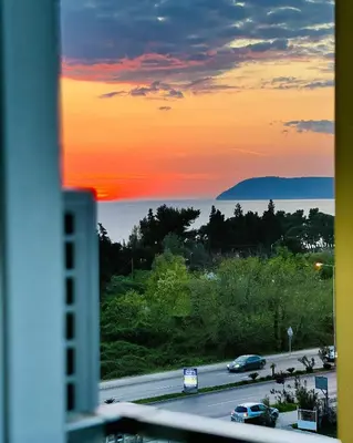 a view of a highway at sunset from a window at Nevenka in Bar