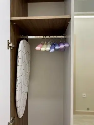 a closet with a shelf with shoes on it at Nevenka in Bar