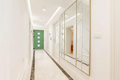 a hallway with mirrors on the walls at Kotor Lux apartments and rooms in Kotor