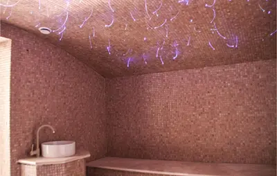 a bathroom with purple lights hanging from the ceiling at Awesome Home In Kotor in Kotor