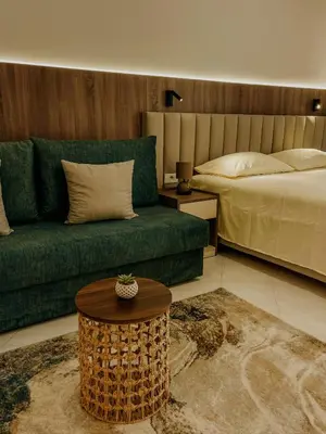 a living room with a couch and a bed at Casa Nita in Ulcinj