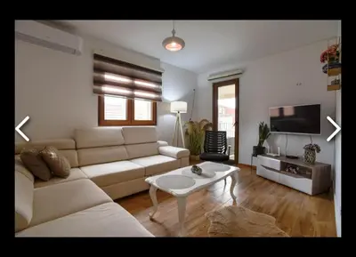 a living room with a couch and a coffee table at Apartments Teona in Bar